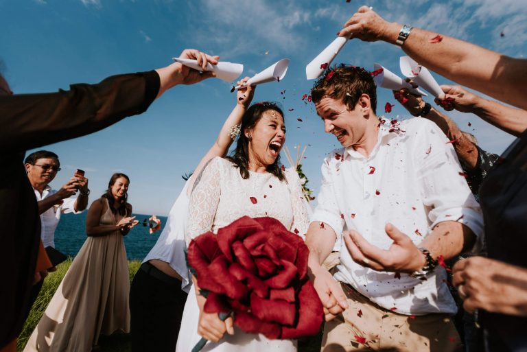 bride and groom wedding ceremony photographer flower beach sydney australia